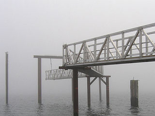 Pier in fog, Sydney, Vancouver Island